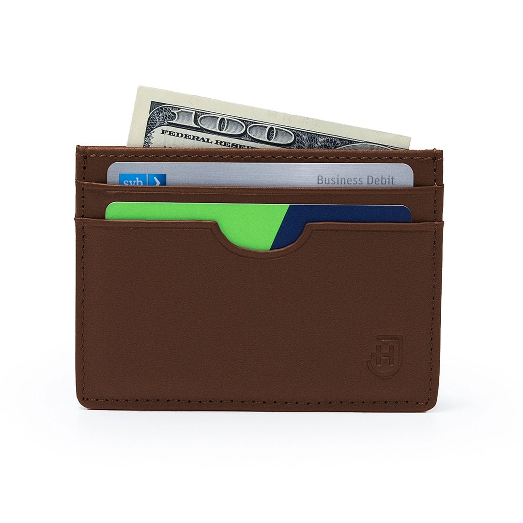 Kamea | James Hawk Stilfuld kortholder. 100% okselæder. Plads til 4 kort og sedler. Minimalistisk design. RFID-beskyttelse.