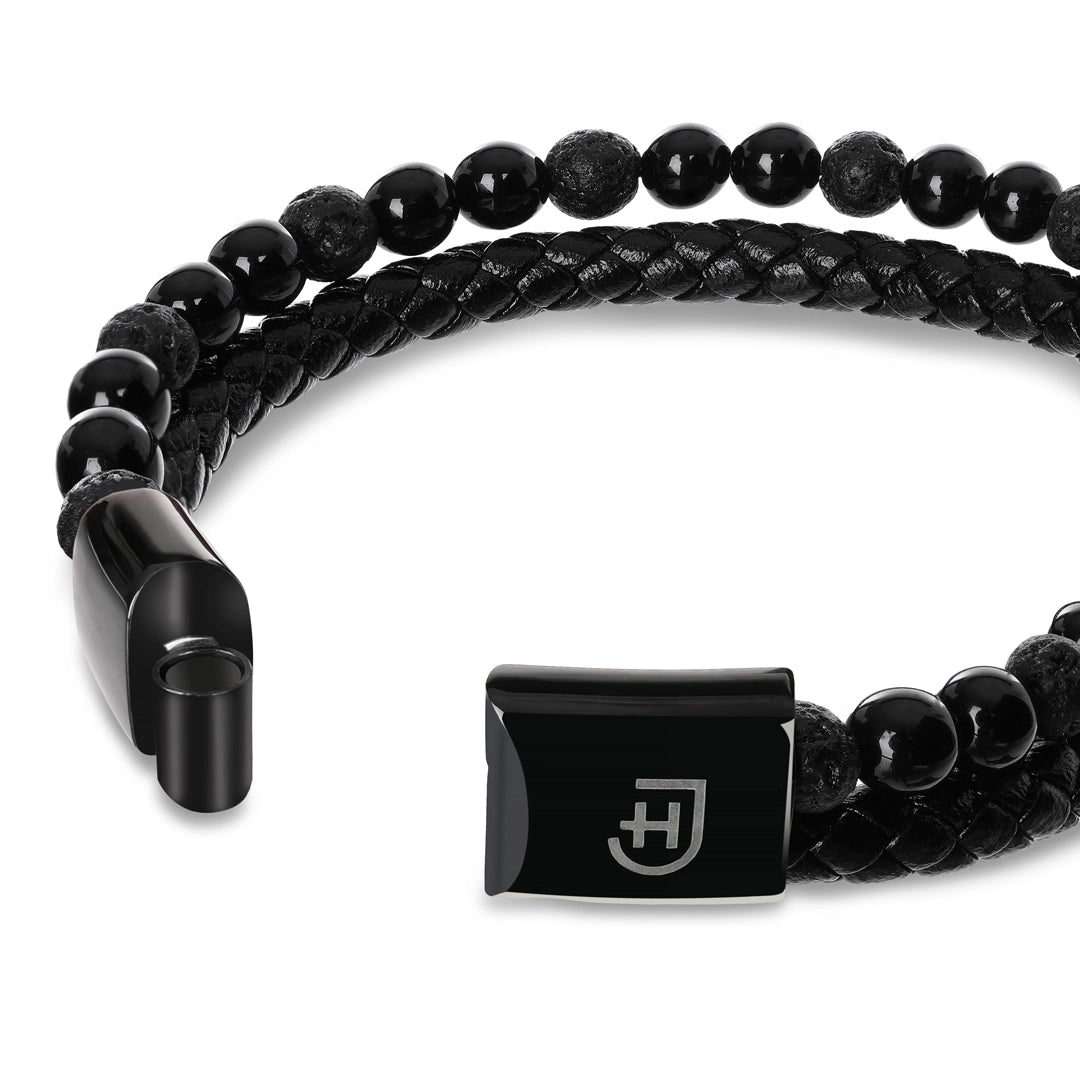Kamea | James Hawk todelt armbånd. Flettet læder og Black lava perler. Sort rustfrit stålspænde med magnetlukning.